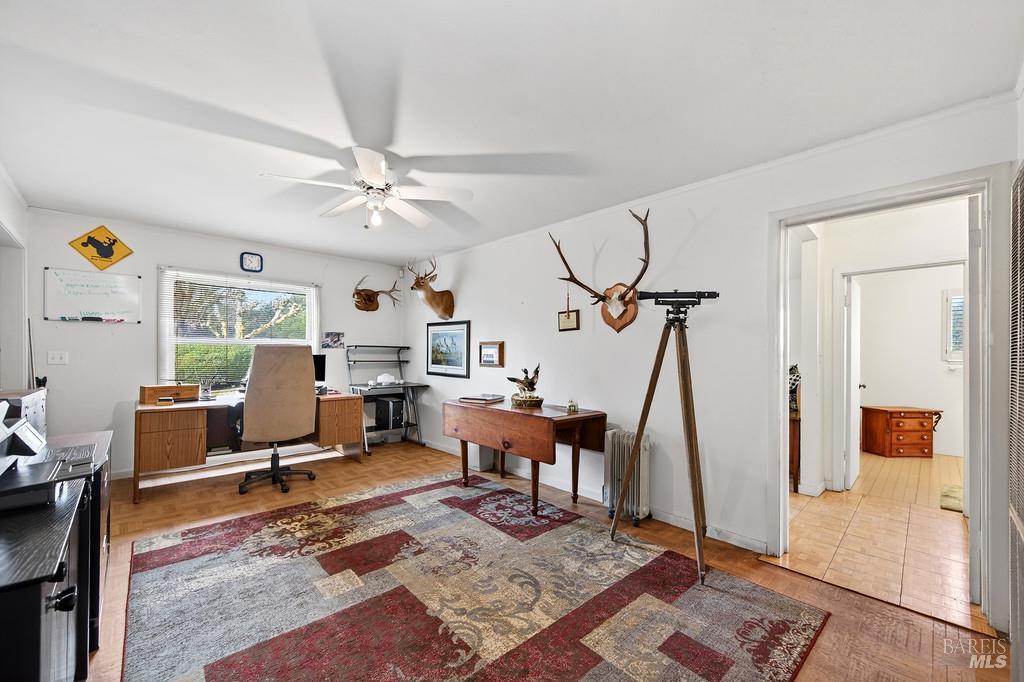 3834 Highway 84 Walnut Grove, CA 95690 - Photo 72 of 84 a living room with furniture a rug and white walls