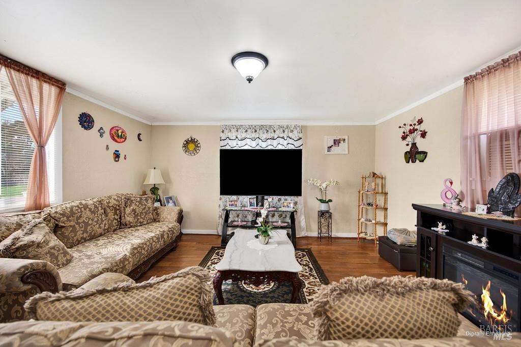 3834 Highway 84 Walnut Grove, CA 95690 - Photo 78 of 84 a living room with furniture and a flat screen tv