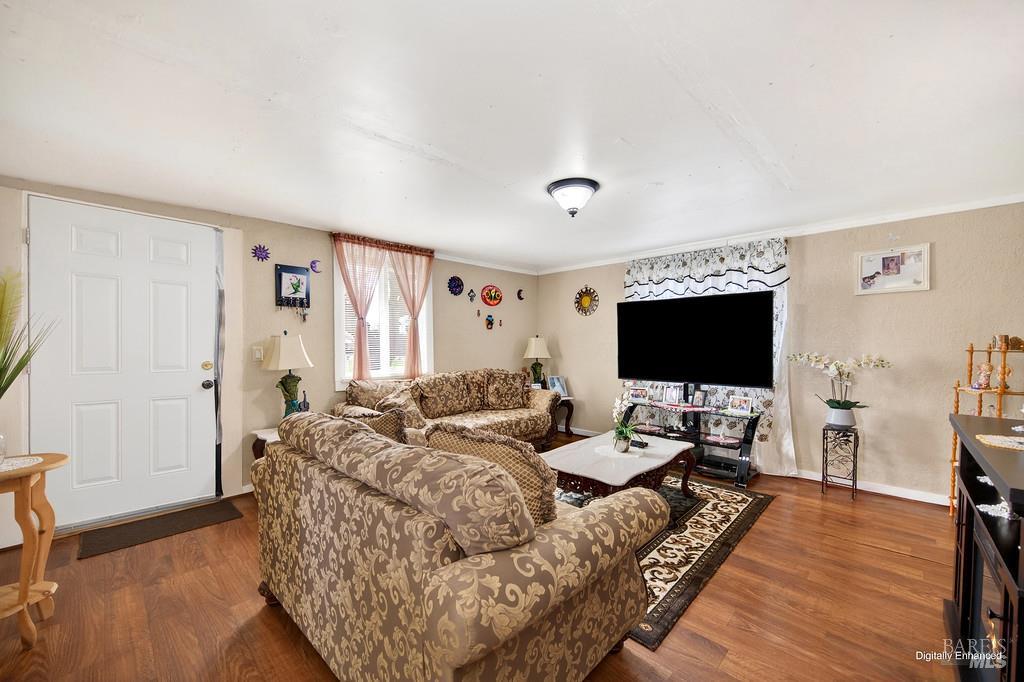 3834 Highway 84 Walnut Grove, CA 95690 - Photo 79 of 84 a living room with furniture and a flat screen tv