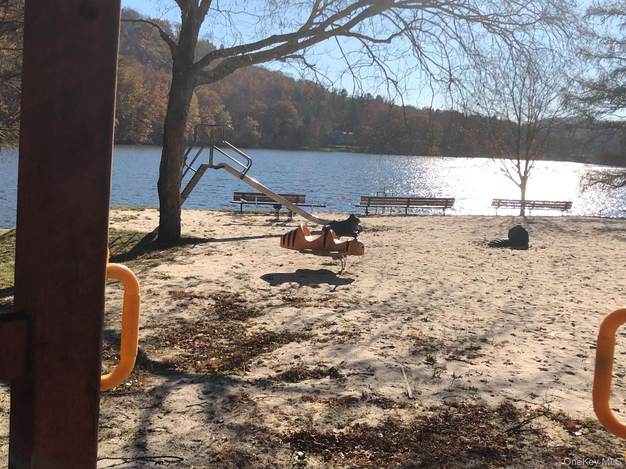 20 Ridge Road Tuxedo Park, NY 10987 - Photo 11 of 13 a view of a yard with a tree