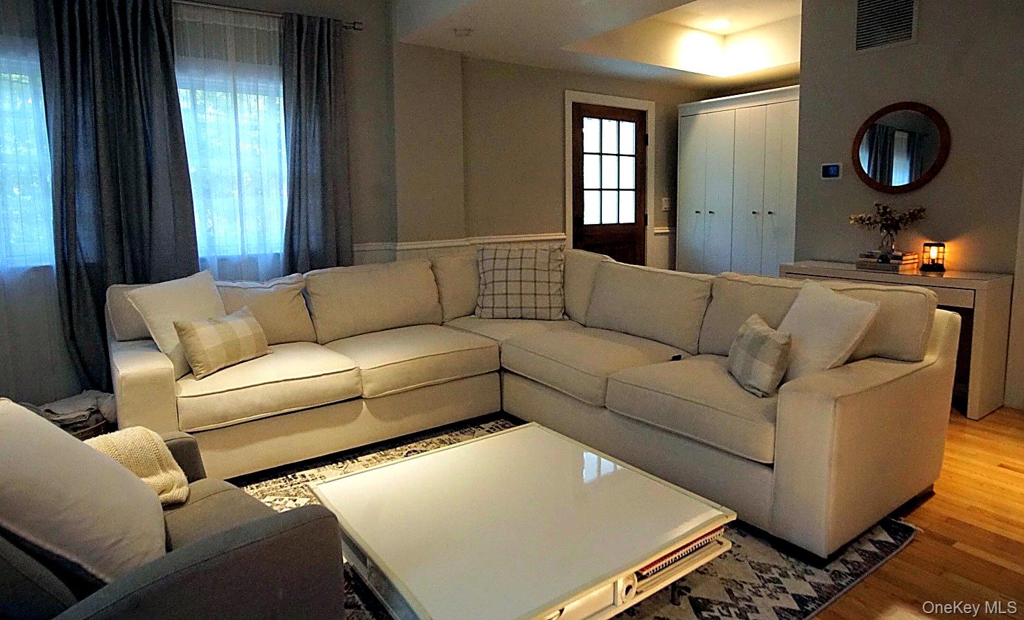 20 Ridge Road Tuxedo Park, NY 10987 - Photo 4 of 13 a living room with furniture and a window