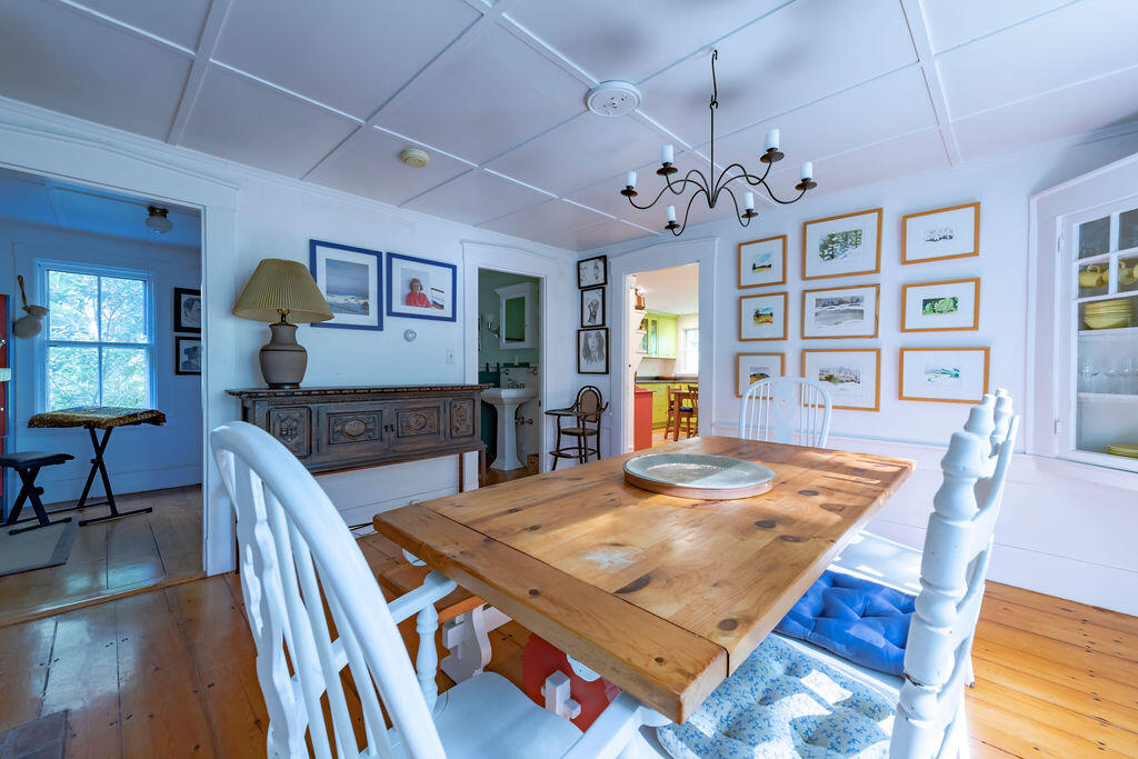 160 Paine Hollow Road Wellfleet, MA 02667 - Photo 13 of 71 a living room with dining table furniture dining table and a flat screen tv