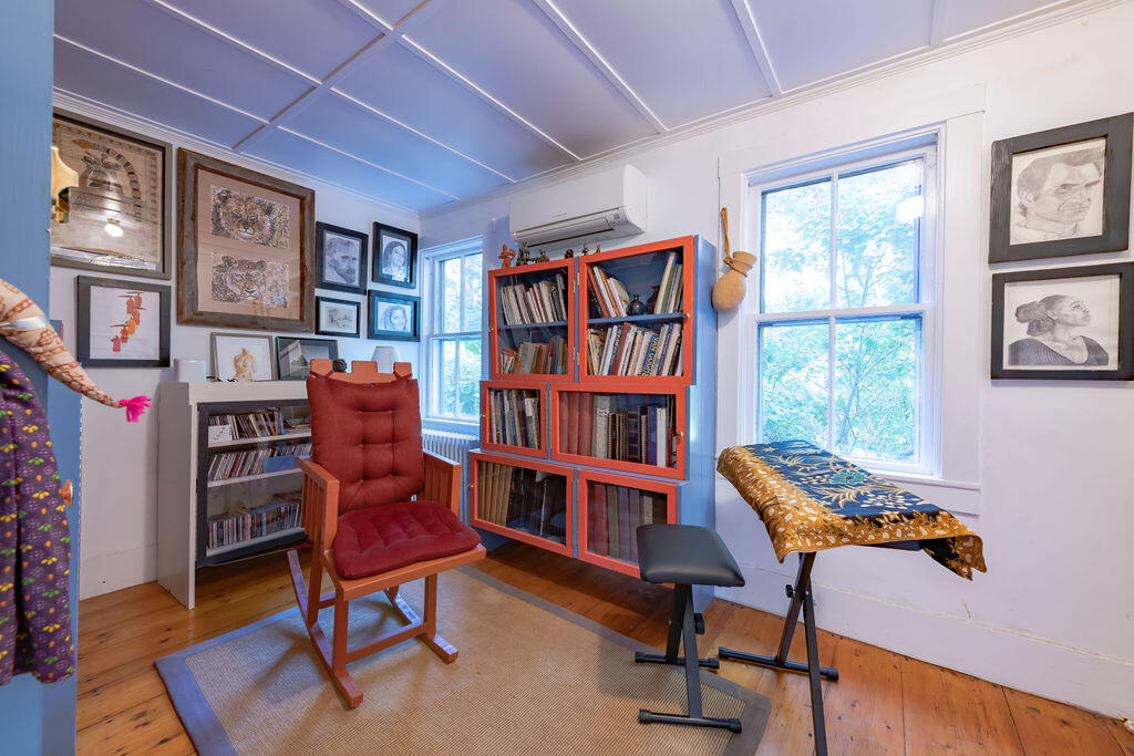 160 Paine Hollow Road Wellfleet, MA 02667 - Photo 20 of 71 a view of a workspace with furniture and a bookshelf