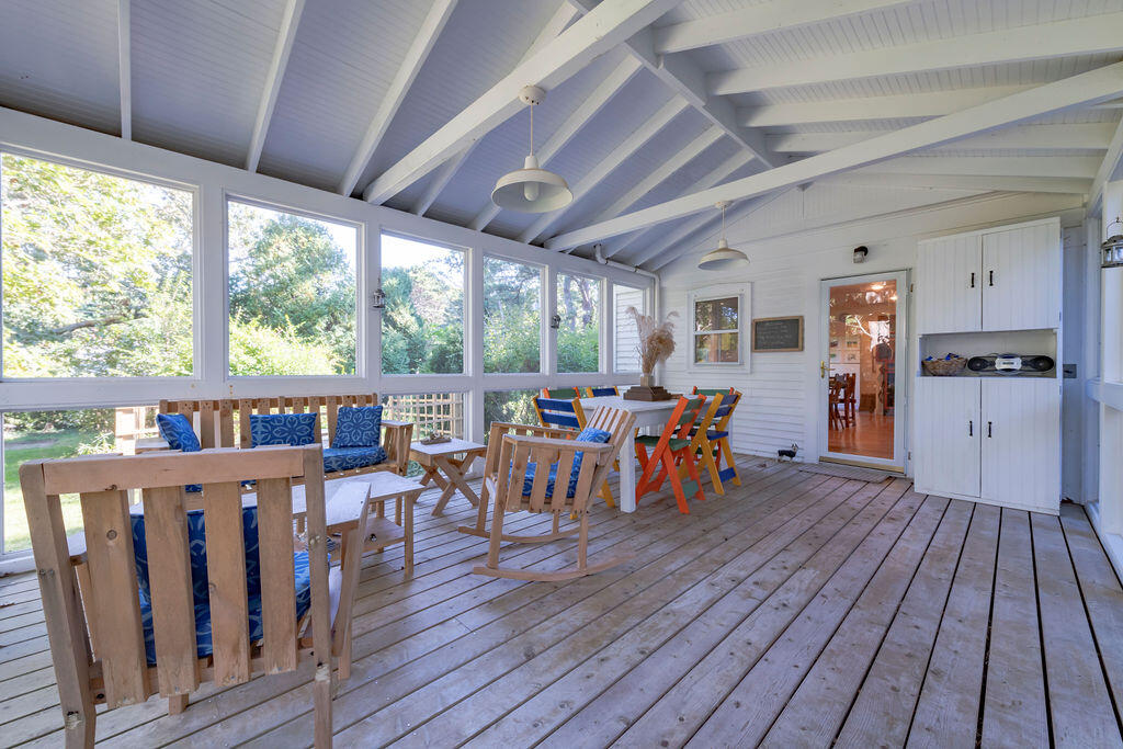 160 Paine Hollow Road Wellfleet, MA 02667 - Photo 26 of 71 a view of a dining room with furniture window and wooden floor
