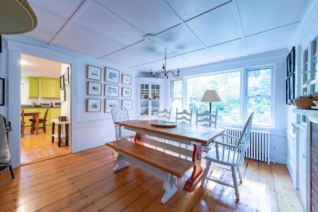 160 Paine Hollow Road Wellfleet, MA 02667 - Photo 4 of 71 a view of a dining room with furniture window and wooden floor