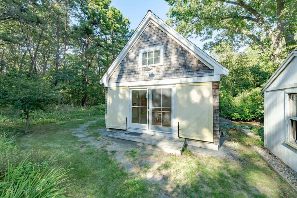 160 Paine Hollow Road Wellfleet, MA 02667 - Photo 46 of 71 a view of a house with backyard