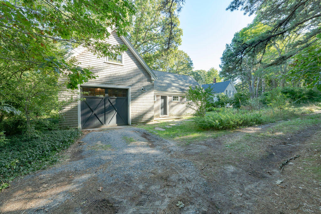 160 Paine Hollow Road Wellfleet, MA 02667 - Photo 49 of 71 a view of a house with large trees