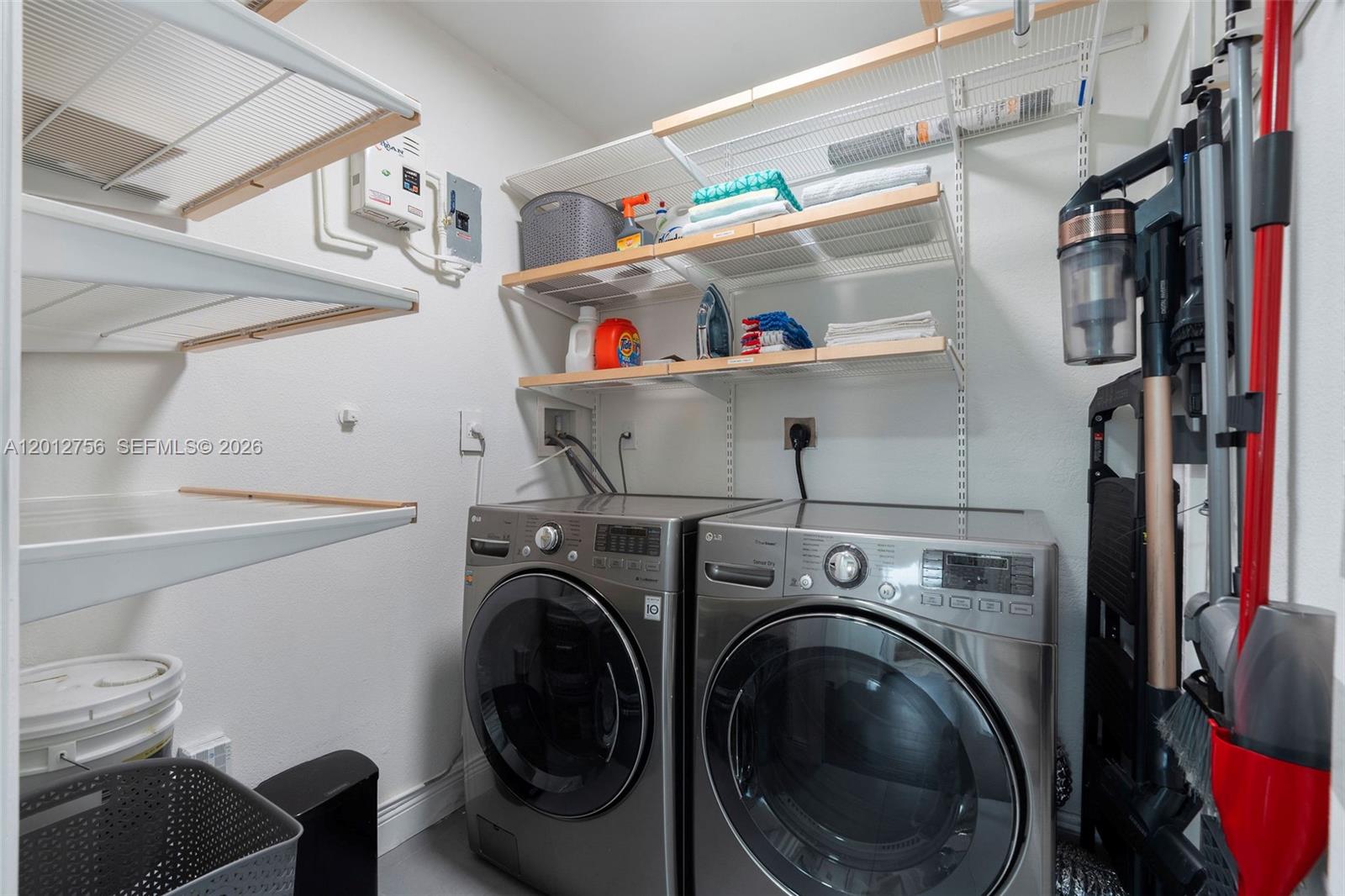 4370 Southwest 11th Street Miami, FL 33134 - Photo 21 of 21 a utility room with dryer and washer