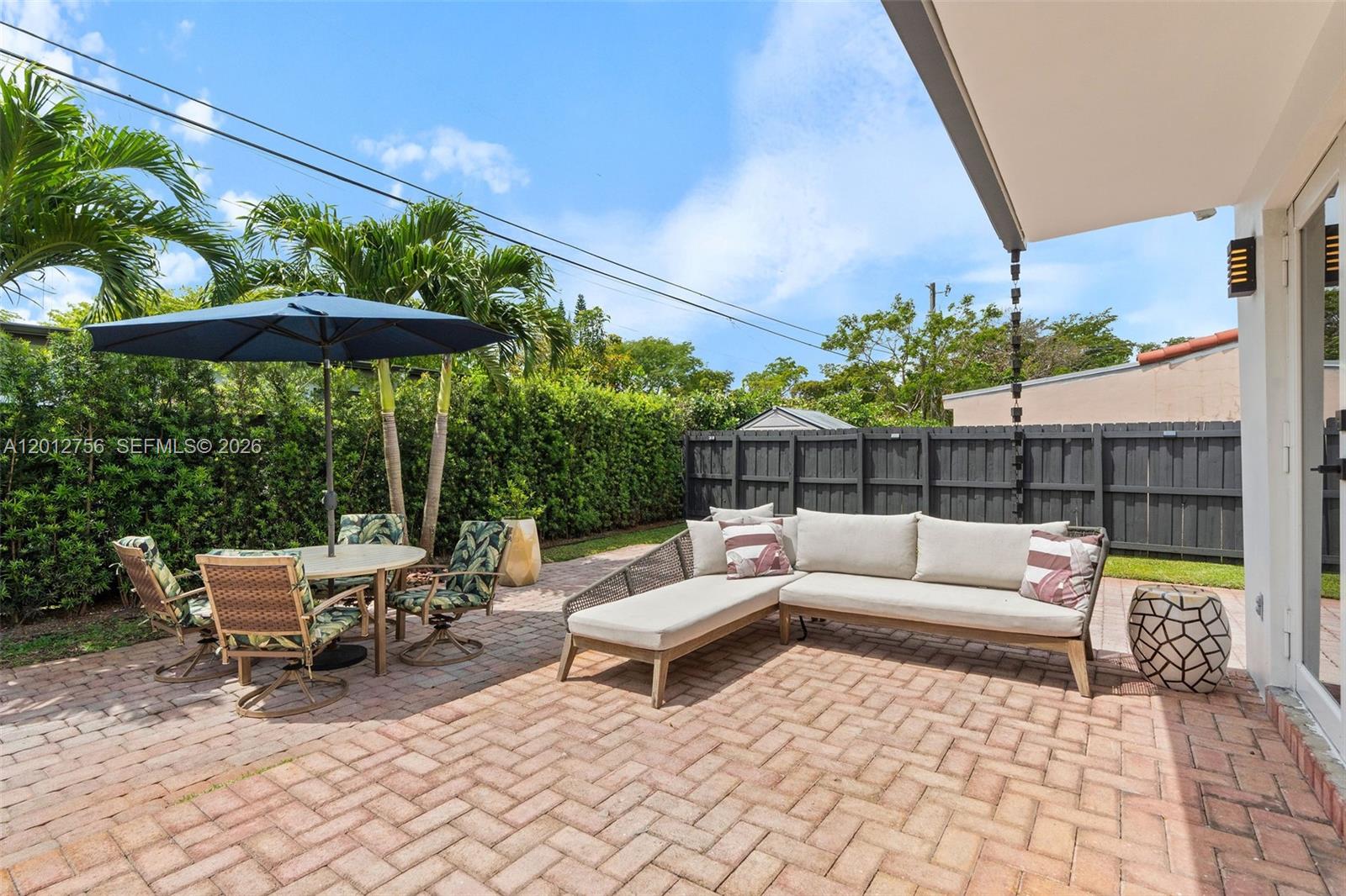 4370 Southwest 11th Street Miami, FL 33134 - Photo 7 of 21 a outdoor living space with furniture and a potted plant