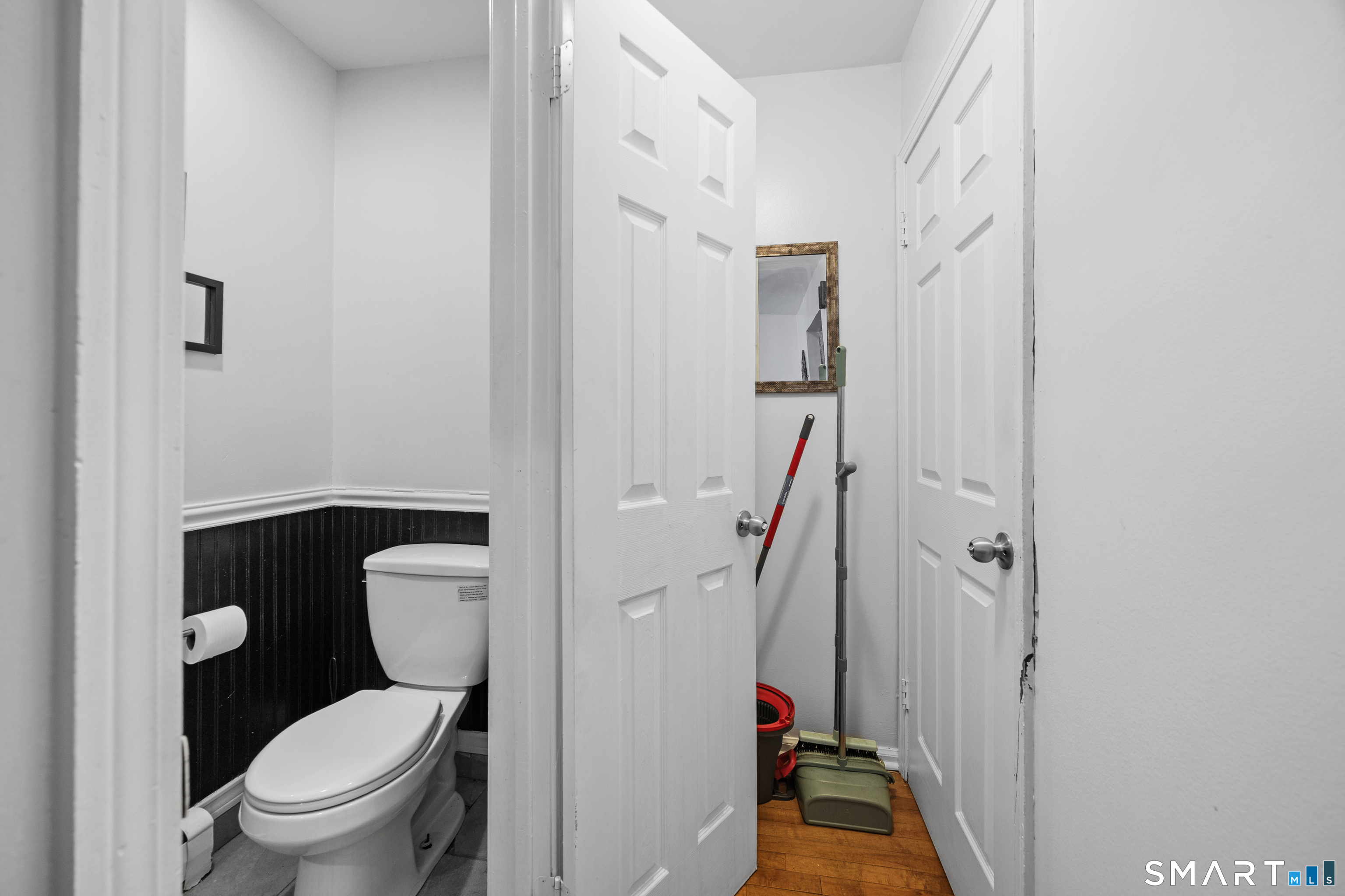 105 Pond Street Bridgeport, CT 06606 - Photo 6 of 26 a bathroom with a toilet and a shower