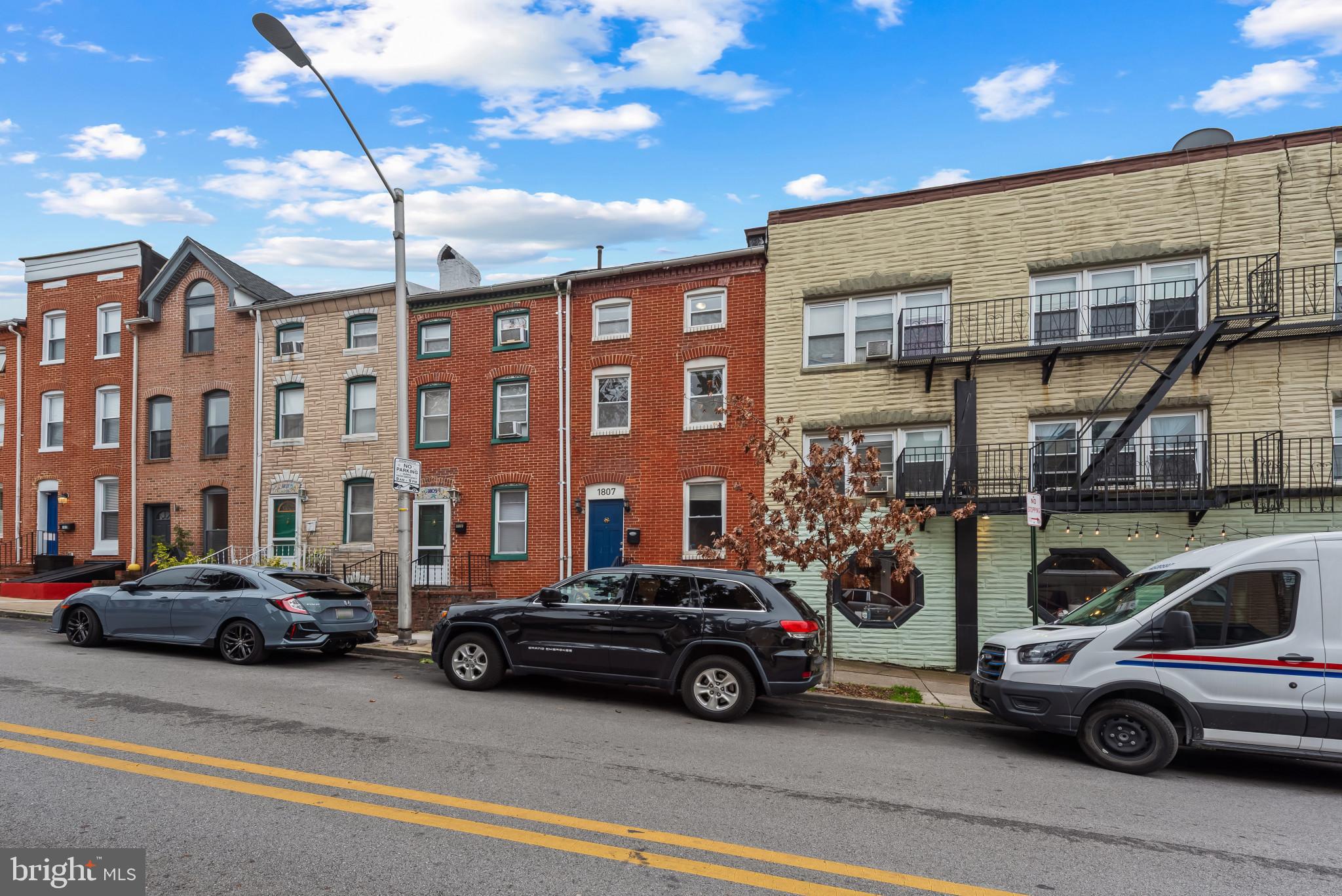 1807 East Lombard Street Baltimore, MD 21231 - Photo 28 of 30 a car parked in front of a building