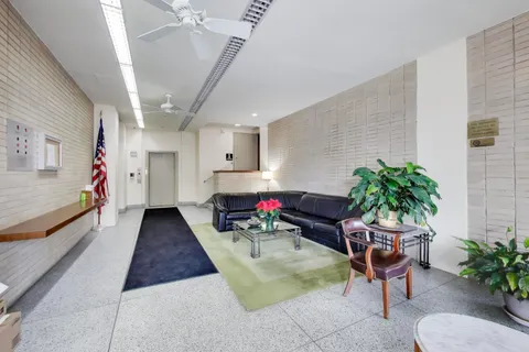 a bathroom with a sink and a shower