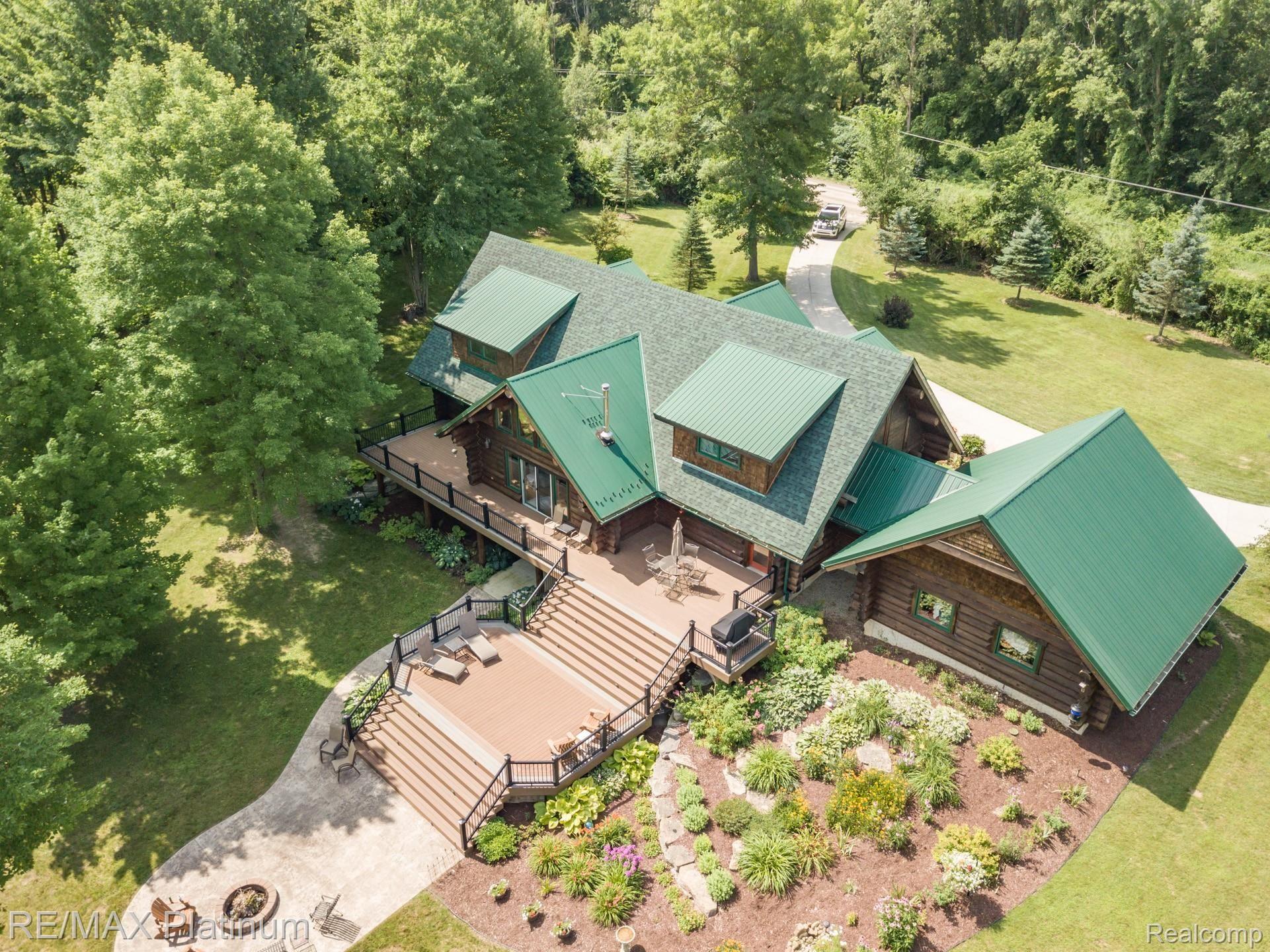 8335 Cedar Lake Road Pinckney, MI 48169 - Photo 42 of 55 Aerial View of Home Exterior