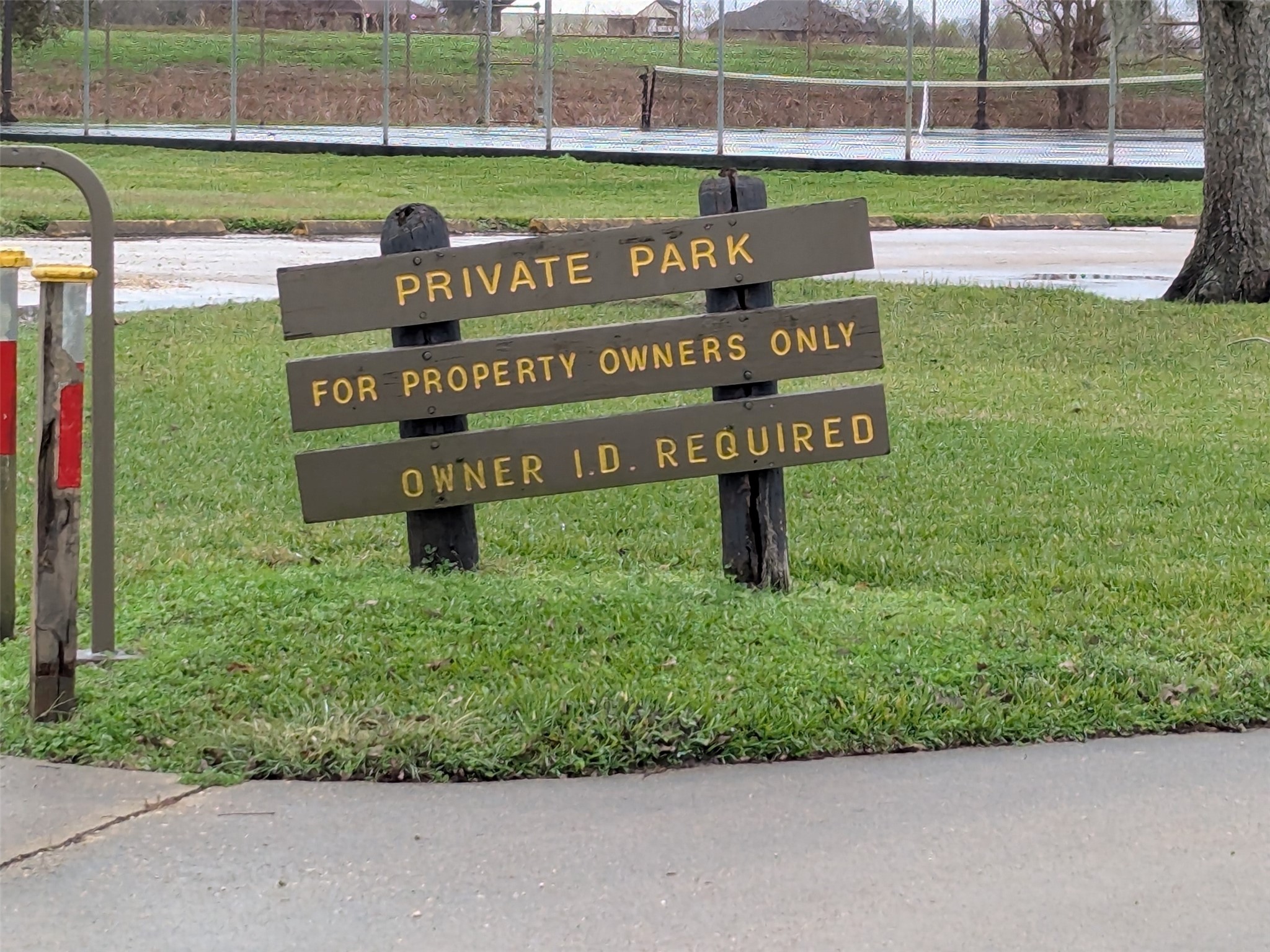861 Longhorn Trail Angleton, TX 77515 - Photo 4 of 6 a view of a park with welcome board