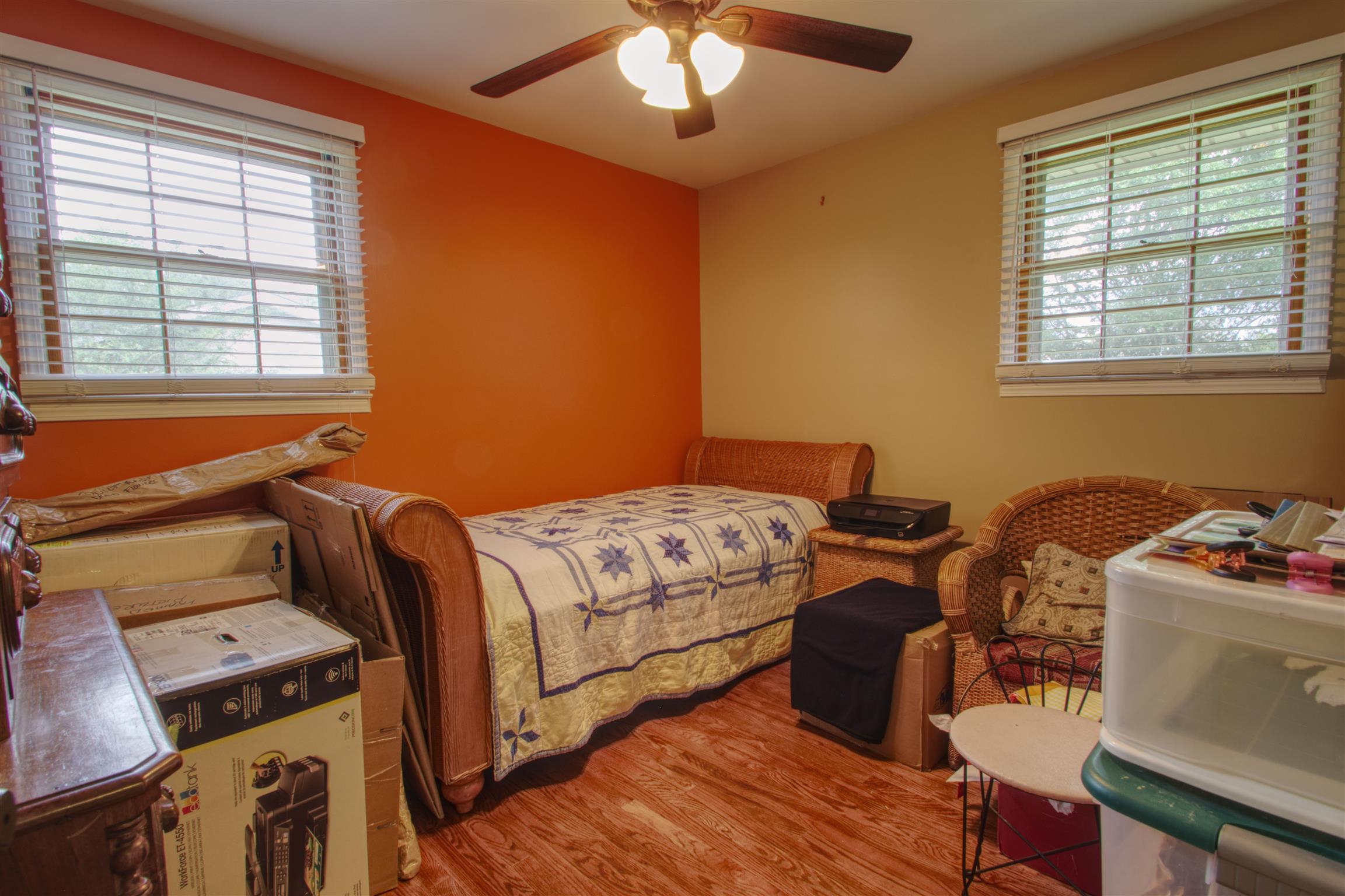 503 Terry Lane Lebanon, TN 37087 - Photo 11 of 16 a bedroom with a bed and wooden floor