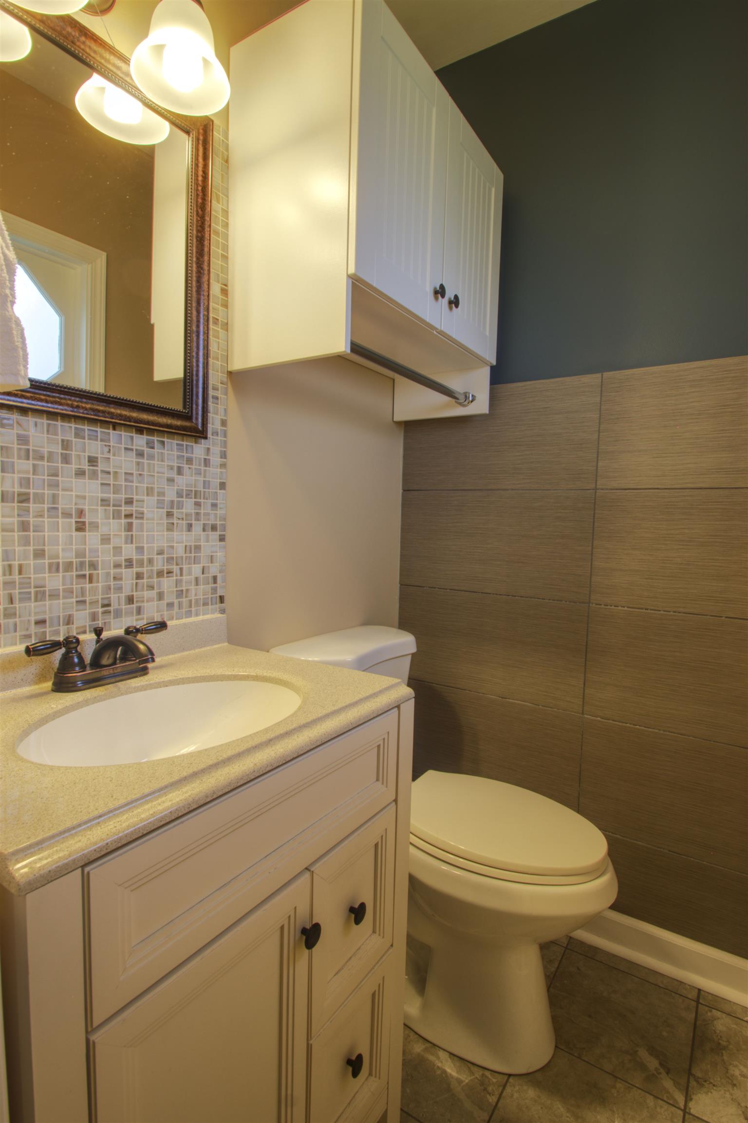 503 Terry Lane Lebanon, TN 37087 - Photo 13 of 16 a bathroom with a sink a toilet and mirror