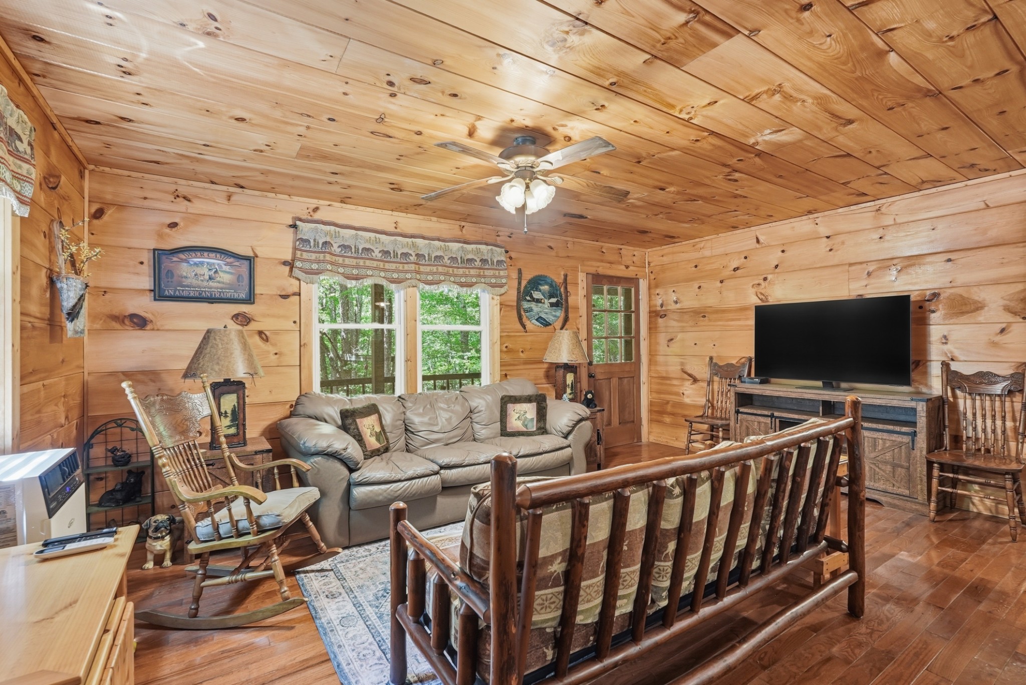 118 Cherokee Road Spencer, TN 38585 - Photo 3 of 85 a living room with furniture and a flat screen tv