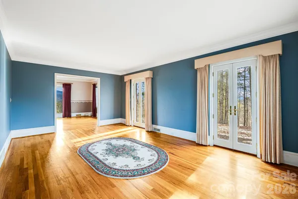 a view of a bedroom with a bed and bathroom