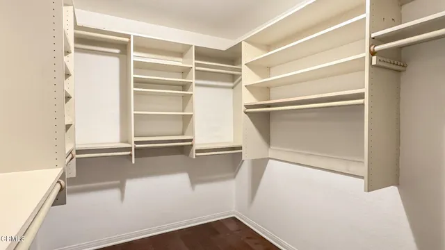 a view of an empty walk in closet