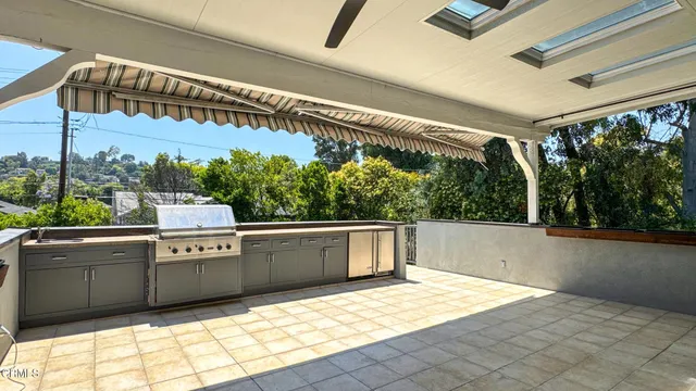 a view of a building with a door and windows