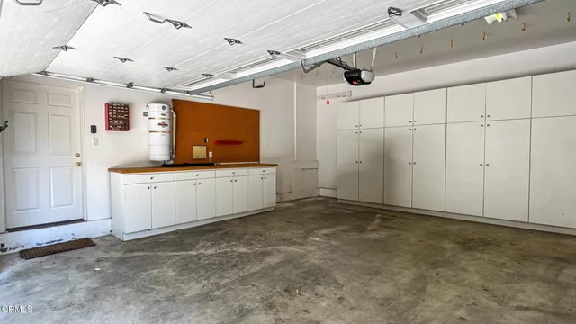 a view of swimming pool with lounge chair