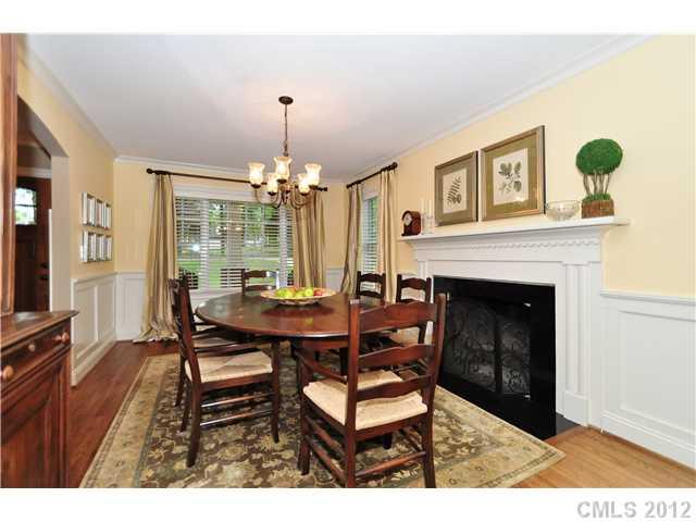 142 McAlway Road Charlotte, NC 28211 - Photo 2 of 16 a living room with furniture and a fireplace