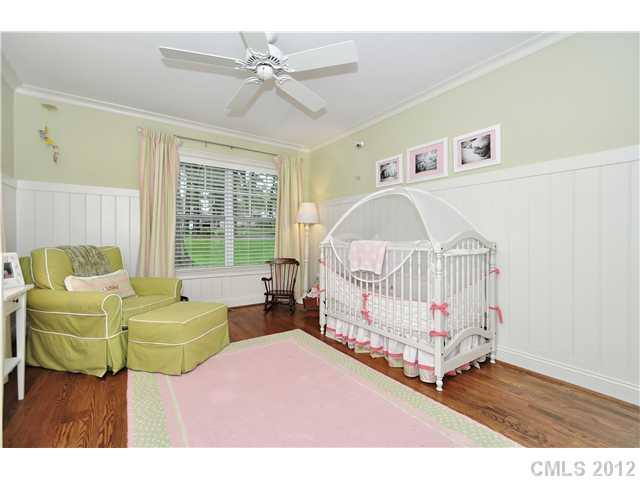 142 McAlway Road Charlotte, NC 28211 - Photo 12 of 16 a bedroom with furniture and a large window
