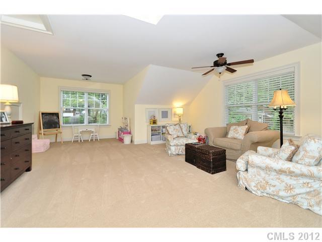 142 McAlway Road Charlotte, NC 28211 - Photo 16 of 16 a living room with furniture and a large window