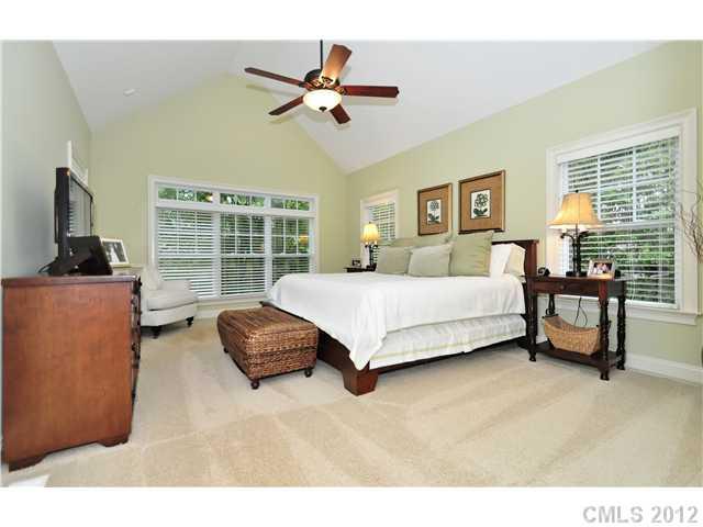 142 McAlway Road Charlotte, NC 28211 - Photo 8 of 16 a bedroom with a bed and a couch