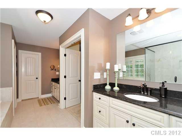 142 McAlway Road Charlotte, NC 28211 - Photo 10 of 16 a bathroom with a sink and a mirror
