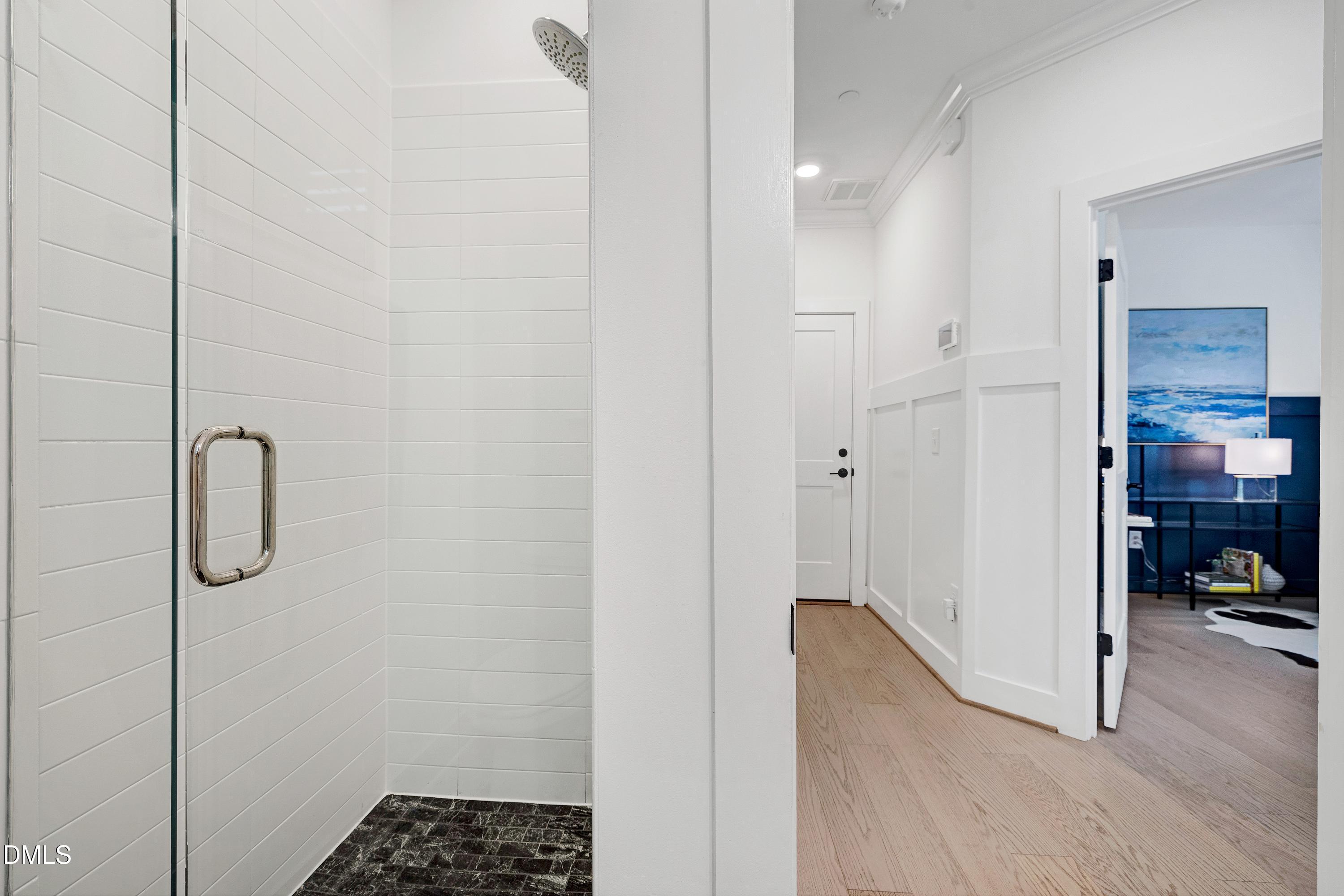 400 Bryan Pointe Drive, Unit 104 Raleigh, NC 27608 - Photo 18 of 66 a bathroom with a shower