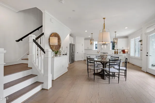 a living room with furniture fireplace and flat screen tv