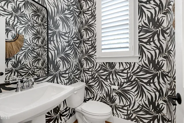 a view of a hallway with staircase