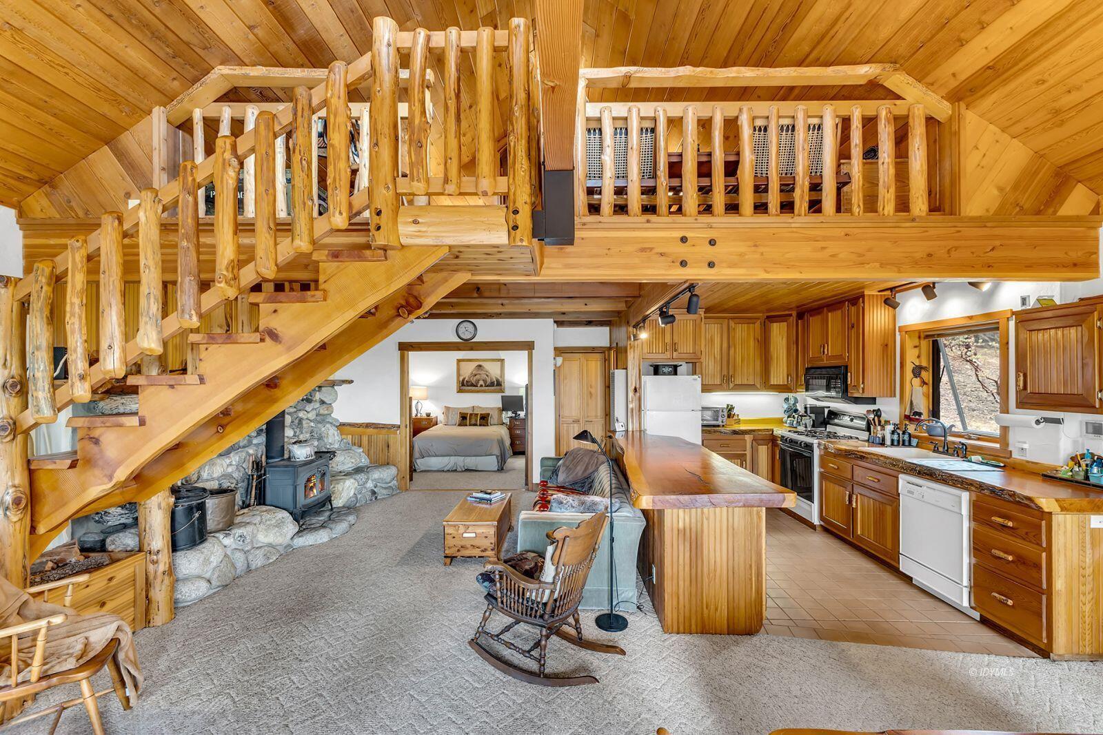 52980 Overlook Drive Idyllwild, CA 92549 - Photo 29 of 60 a view of a kitchen with dining table and chairs