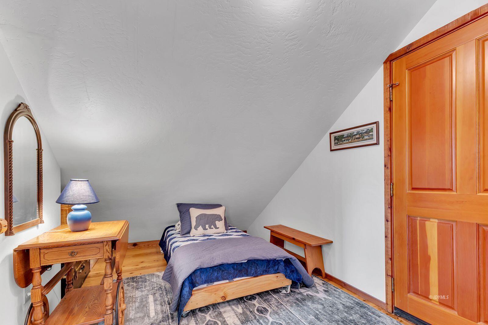 52980 Overlook Drive Idyllwild, CA 92549 - Photo 34 of 60 a bedroom with bed and window