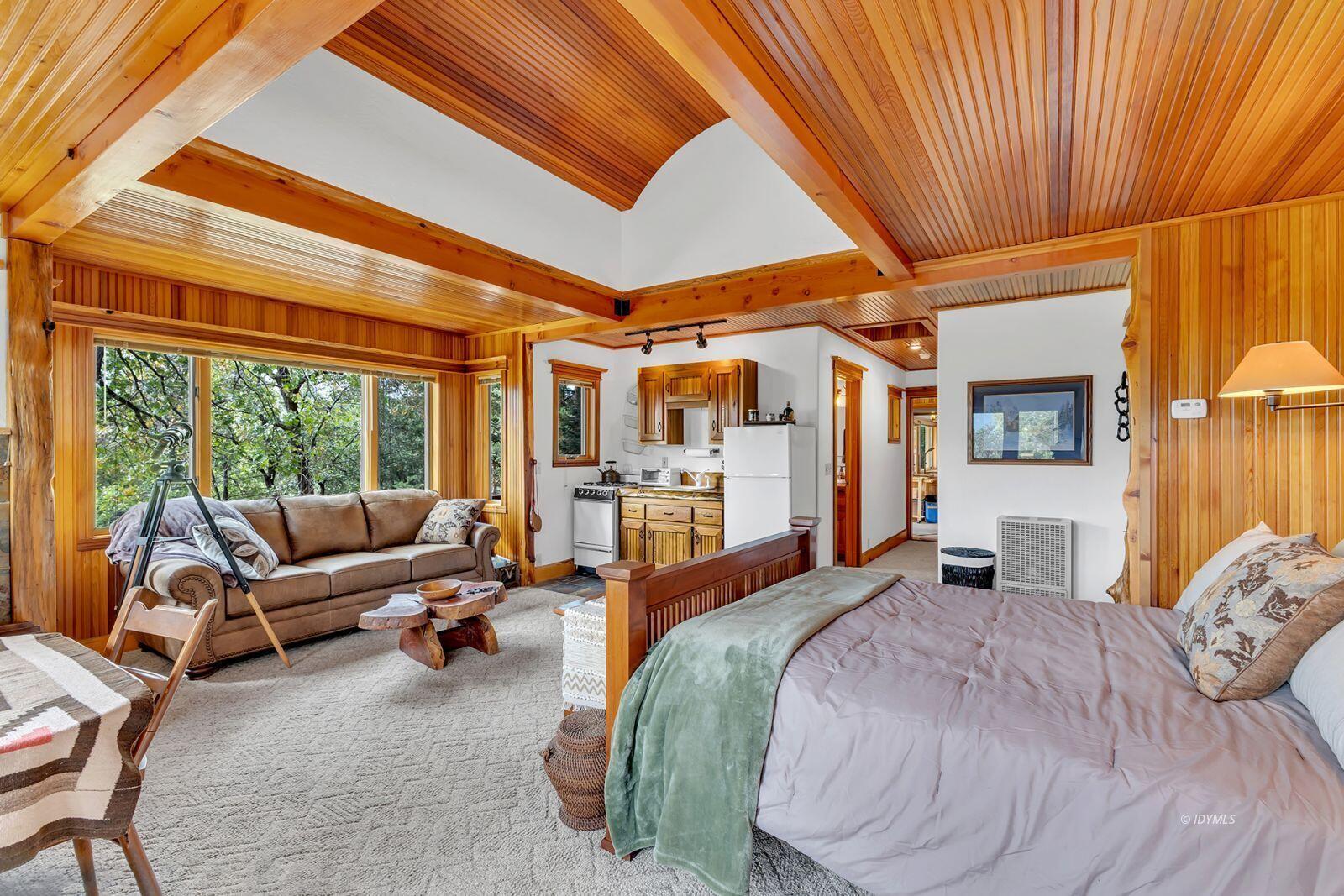 52980 Overlook Drive Idyllwild, CA 92549 - Photo 46 of 60 a bed room with a bed and a couch