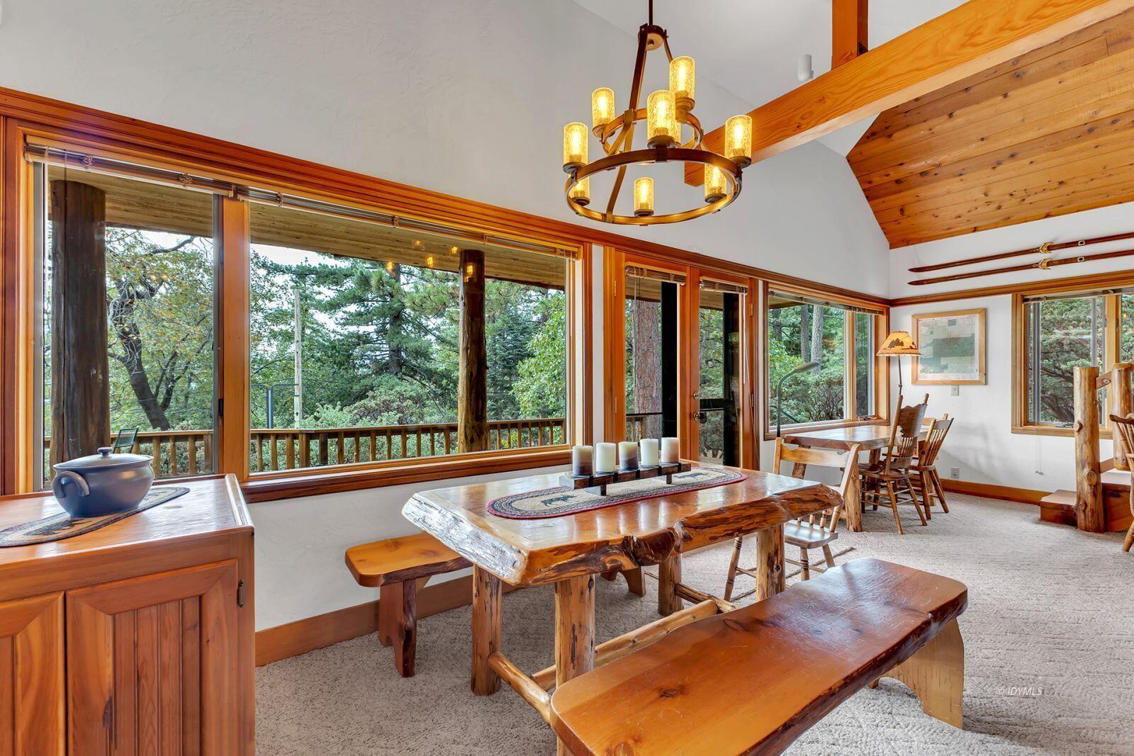 52980 Overlook Drive Idyllwild, CA 92549 - Photo 8 of 60 a view of a dining room with furniture window and outside view