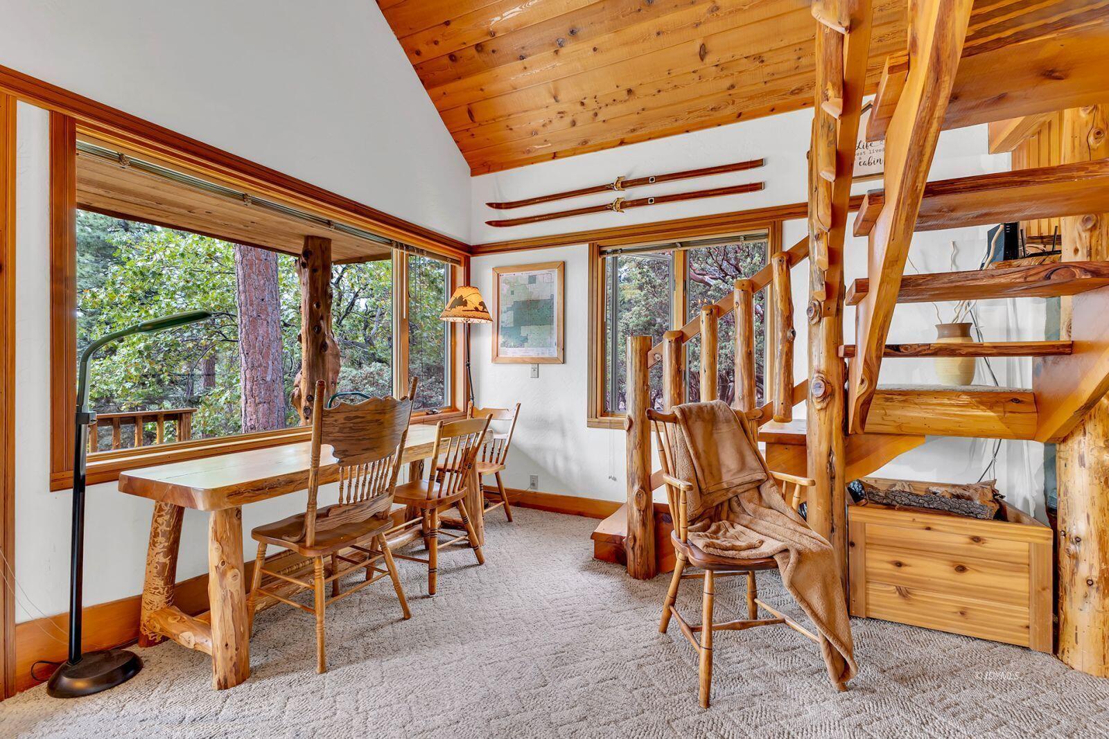 52980 Overlook Drive Idyllwild, CA 92549 - Photo 10 of 60 a view of a dining room with furniture window and outside view