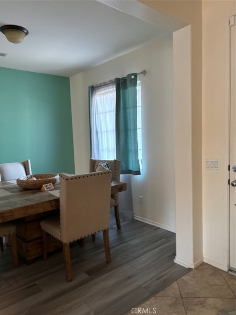 2090 Trinket Circle San Jacinto, CA 92582 - Photo 14 of 22 a view of a workspace with furniture and wooden floor