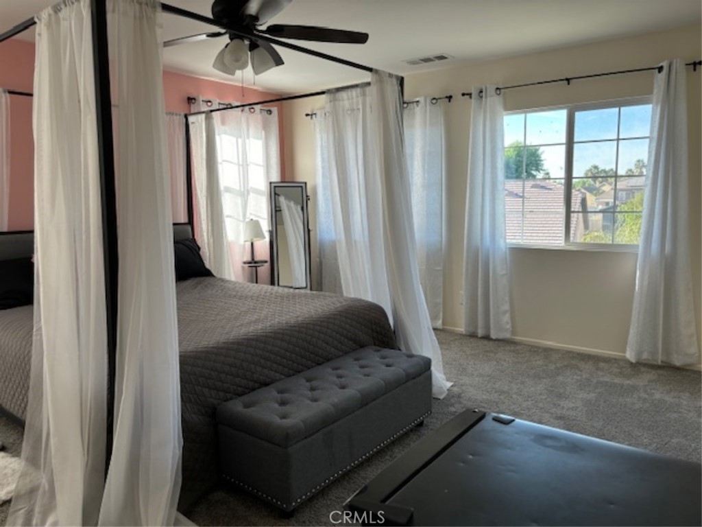 2090 Trinket Circle San Jacinto, CA 92582 - Photo 17 of 22 a living room with furniture and a window