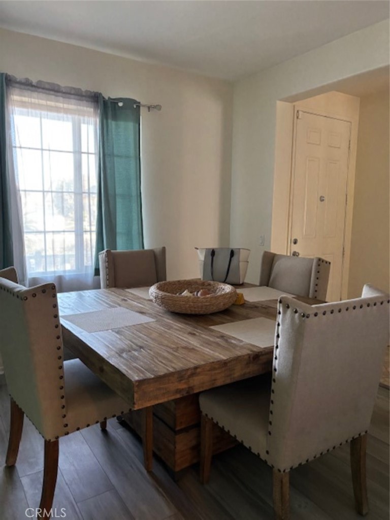 2090 Trinket Circle San Jacinto, CA 92582 - Photo 4 of 22 a view of a dining room with furniture and window