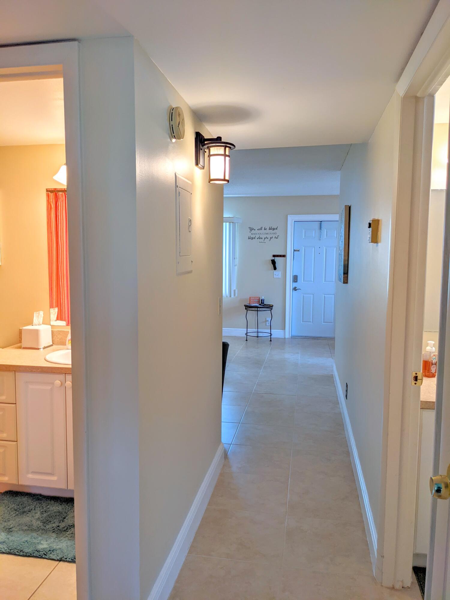 405 Monaco Way, Unit 405 Delray Beach, FL 33446 - Photo 15 of 30 Hall to Front Door