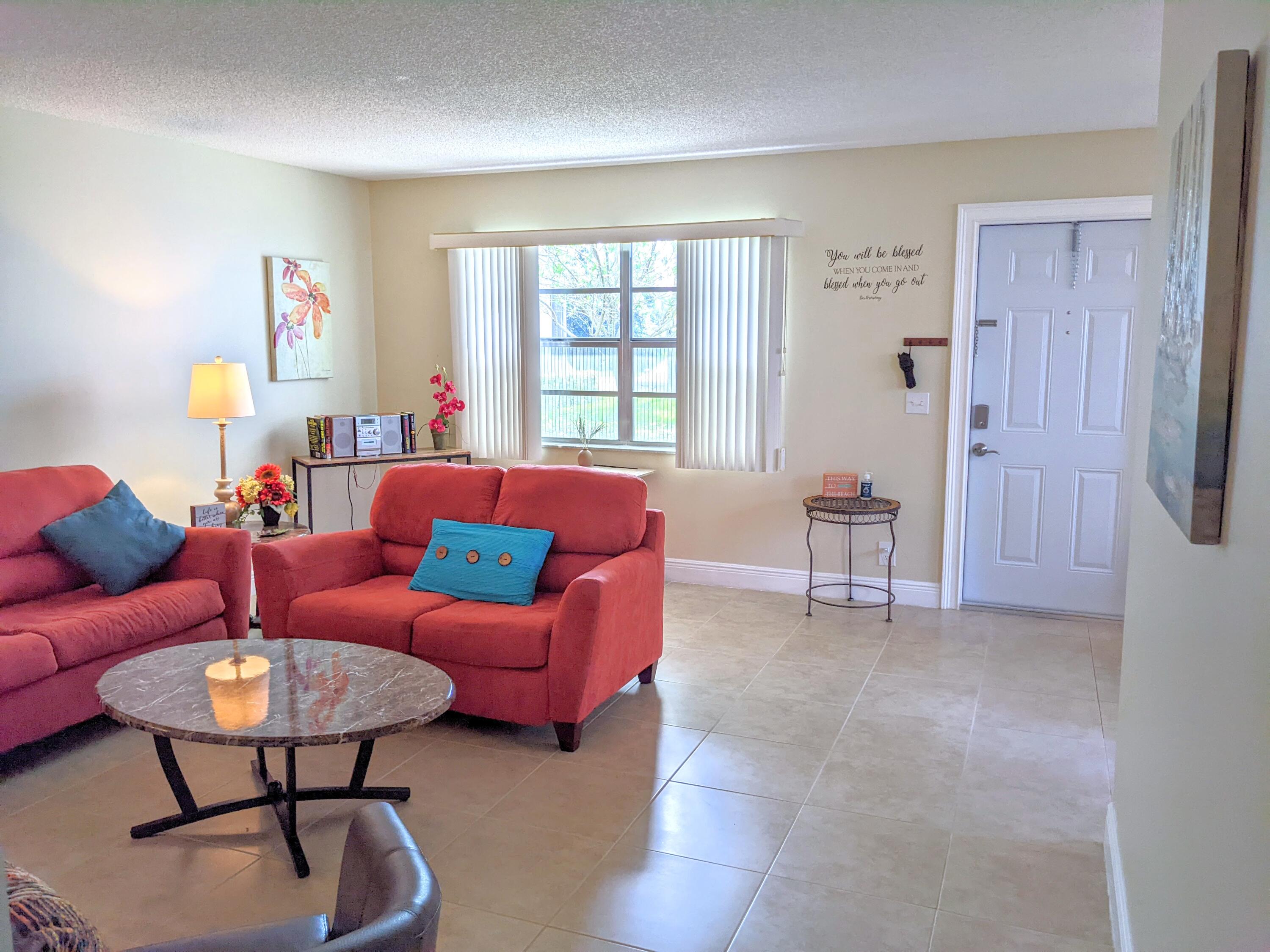 405 Monaco Way, Unit 405 Delray Beach, FL 33446 - Photo 22 of 30 Wide Living Room View
