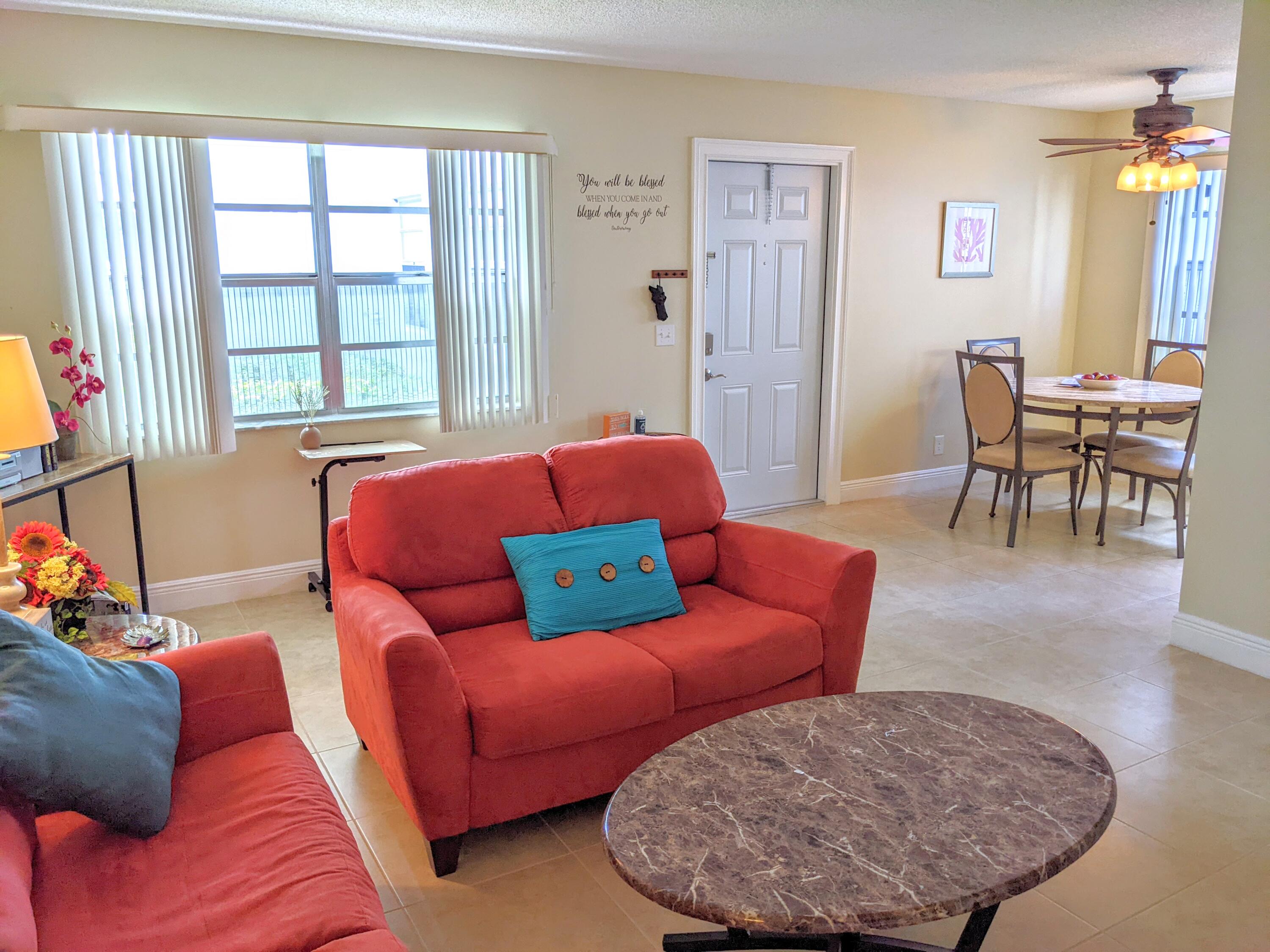 405 Monaco Way, Unit 405 Delray Beach, FL 33446 - Photo 23 of 30 Living Room to Dining Area