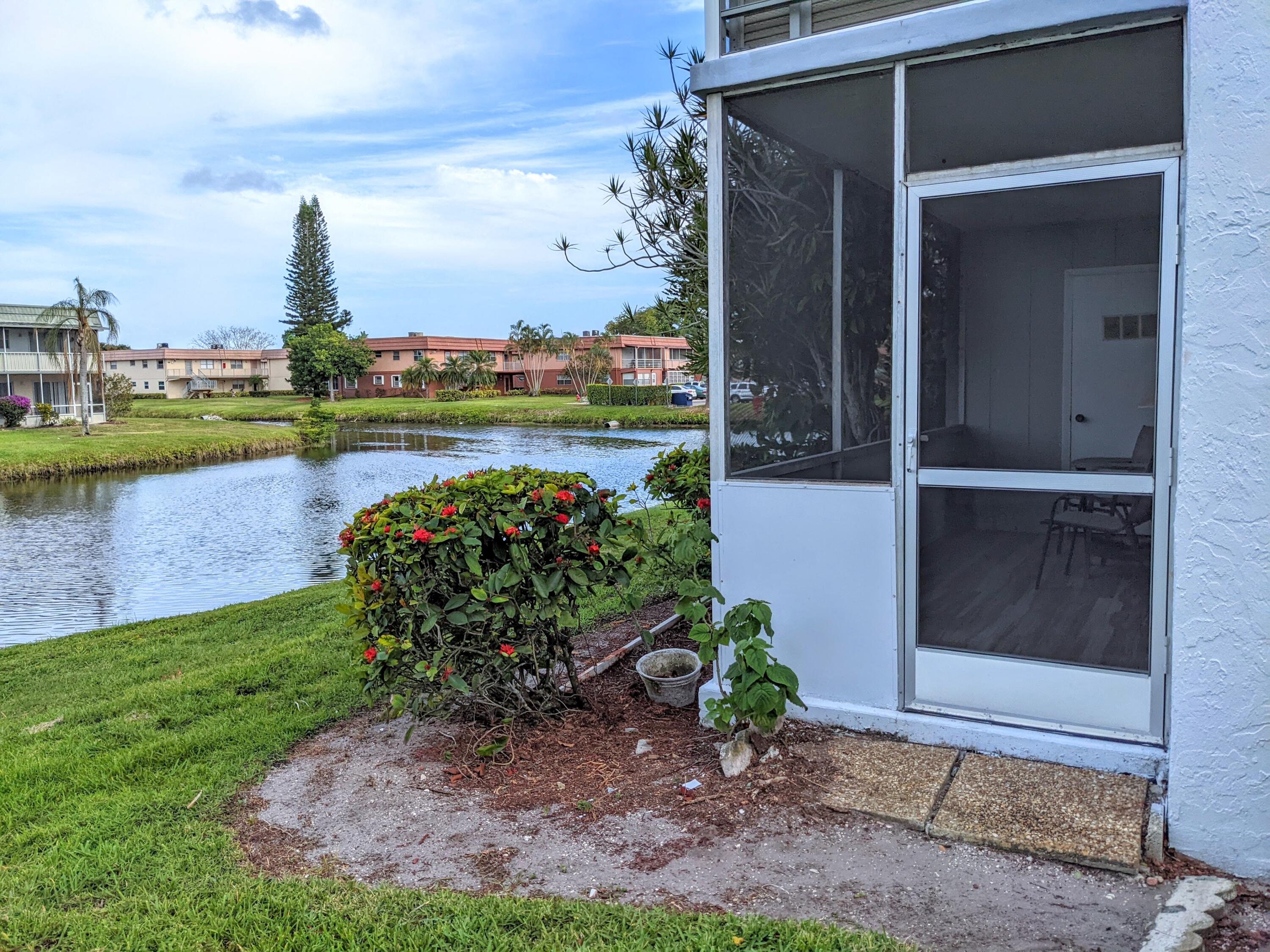 405 Monaco Way, Unit 405 Delray Beach, FL 33446 - Photo 27 of 30 View from Patio Door