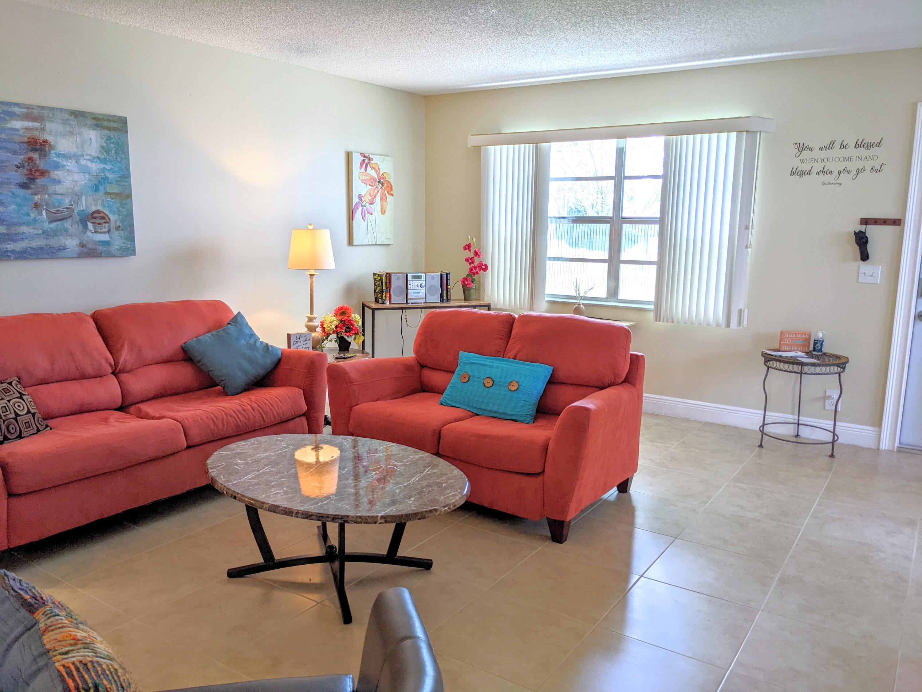 405 Monaco Way, Unit 405 Delray Beach, FL 33446 - Photo 3 of 30 Light Bright Living Room