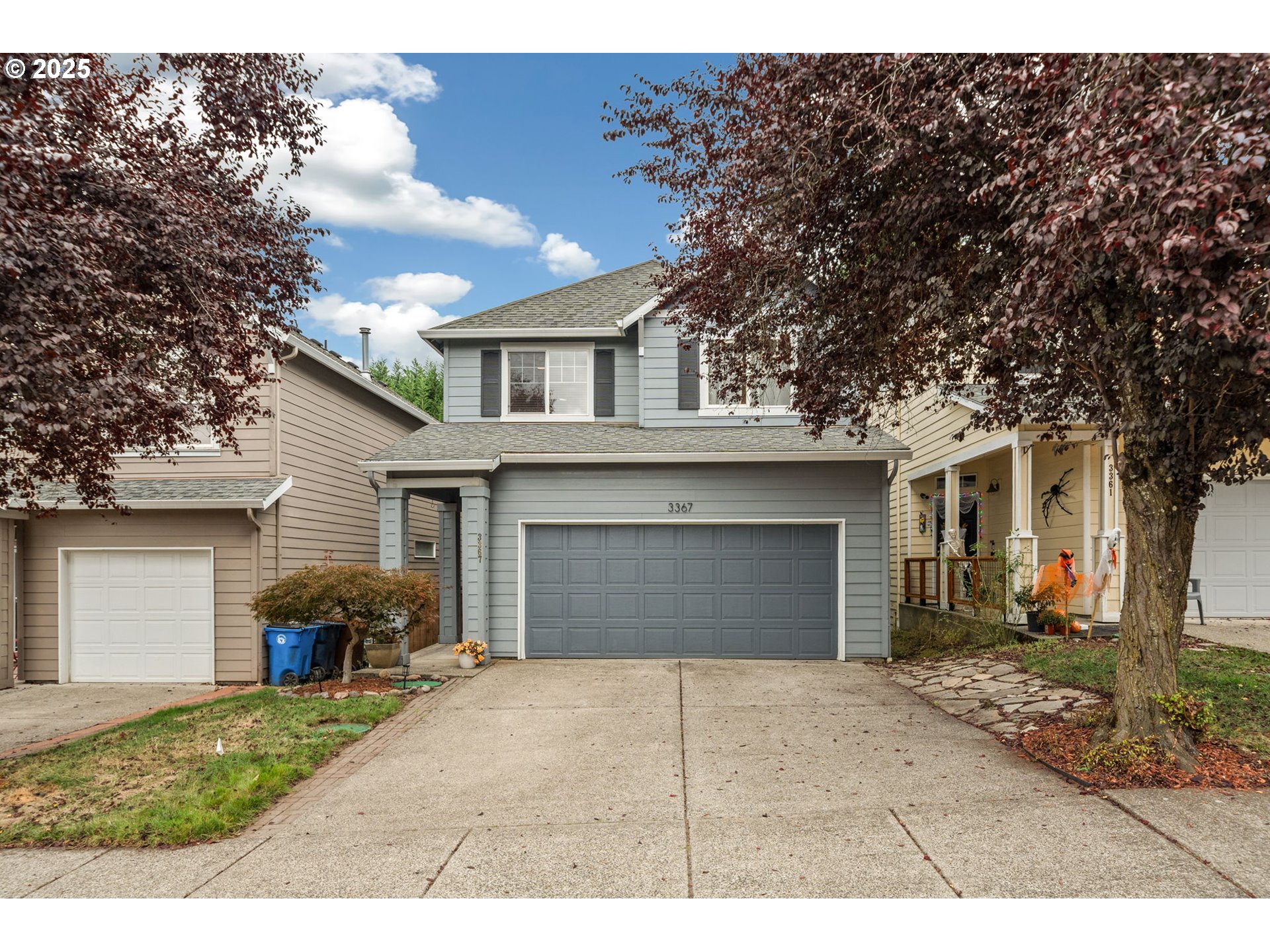 3367 Northwest 31st Circle Camas, WA 98607 - Photo 1 of 30 a front view of a house with a yard and garage