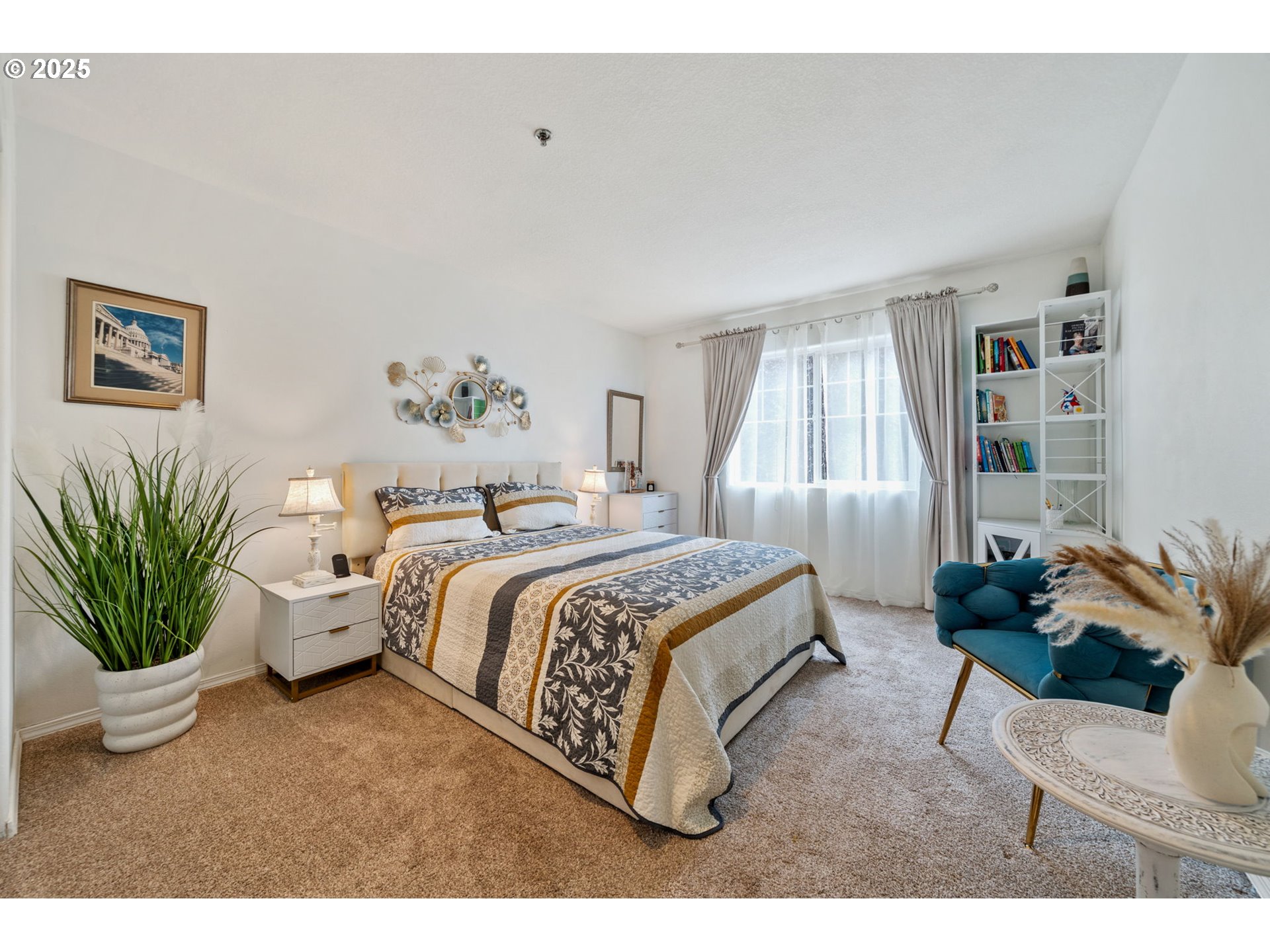 3367 Northwest 31st Circle Camas, WA 98607 - Photo 20 of 30 a spacious bedroom with a bed and a couch
