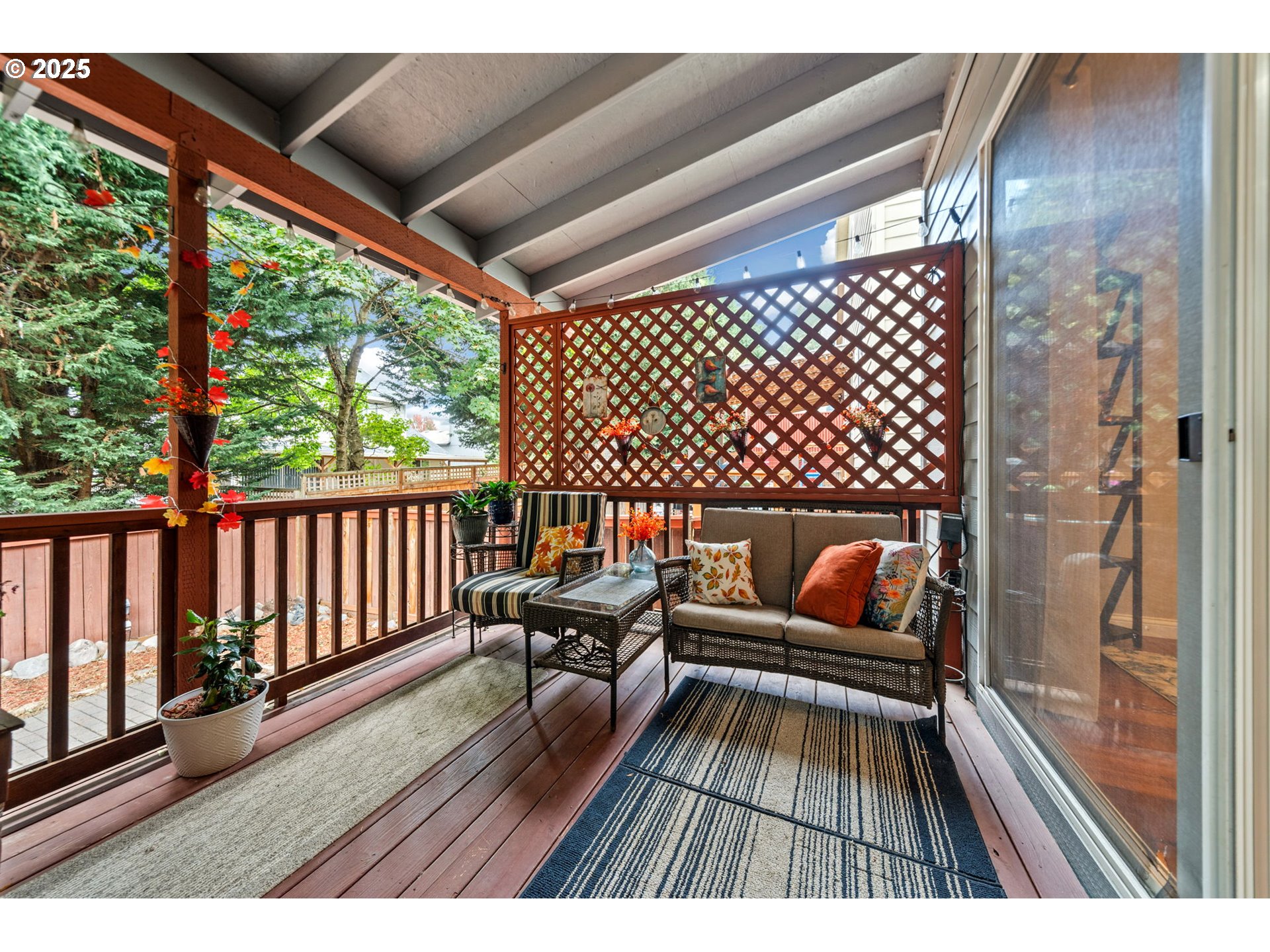 3367 Northwest 31st Circle Camas, WA 98607 - Photo 26 of 30 a balcony with wooden floor table and chairs