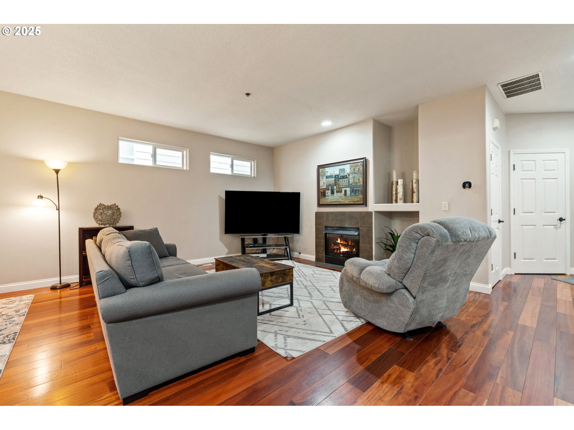 3367 Northwest 31st Circle Camas, WA 98607 - Photo 7 of 30 a living room with furniture and a flat screen tv
